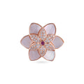 rose gold floral style ring with beautiful pink ruby stone at the centrer