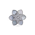 Silver floral style ring with beautiful white stone at the centre